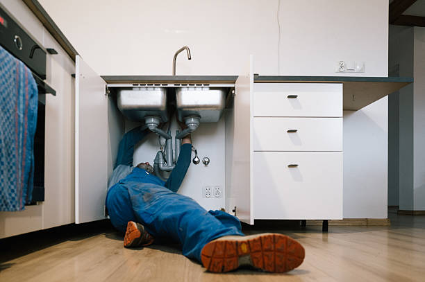 Professional Plumbing technician working in Ledbetter, KY